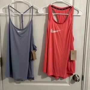 Nike woman’s DRI-FIT tanks